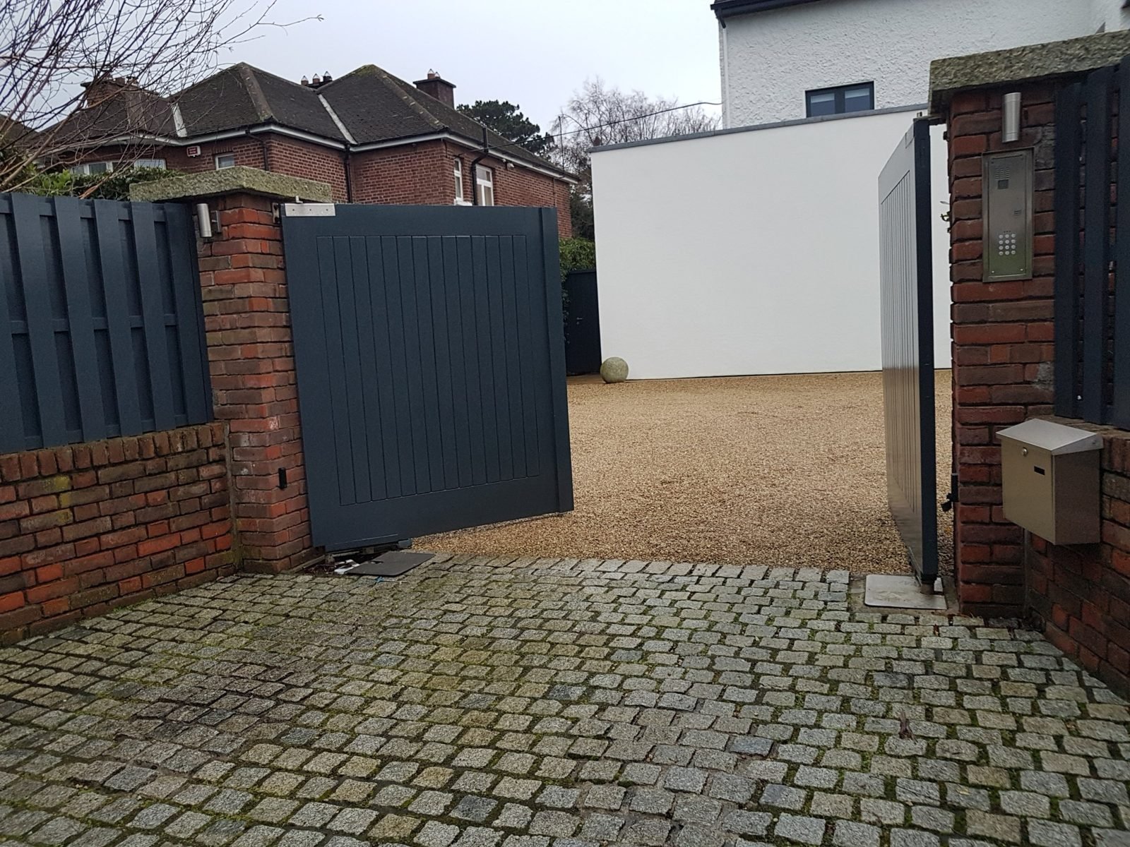 Boarded swing gates with an intercom like these for homes in Holywood